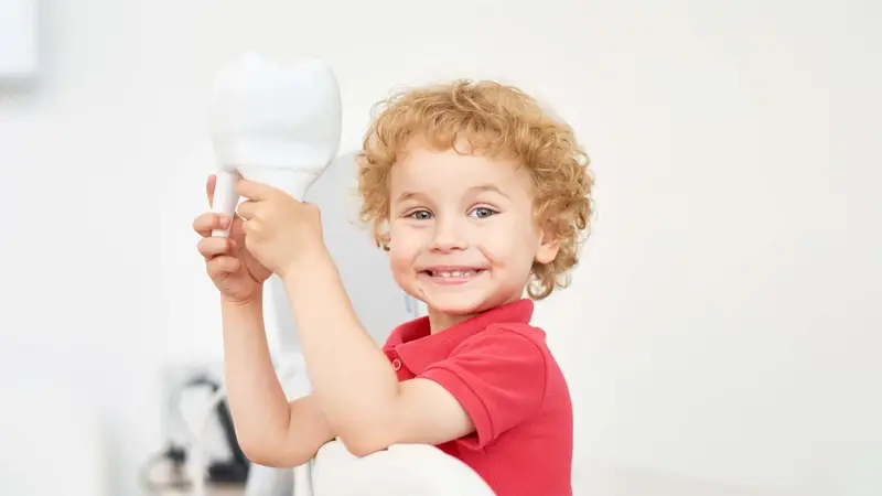 Smiling toddler representing early years paediatric first aid Assured First Aid Wiltshire